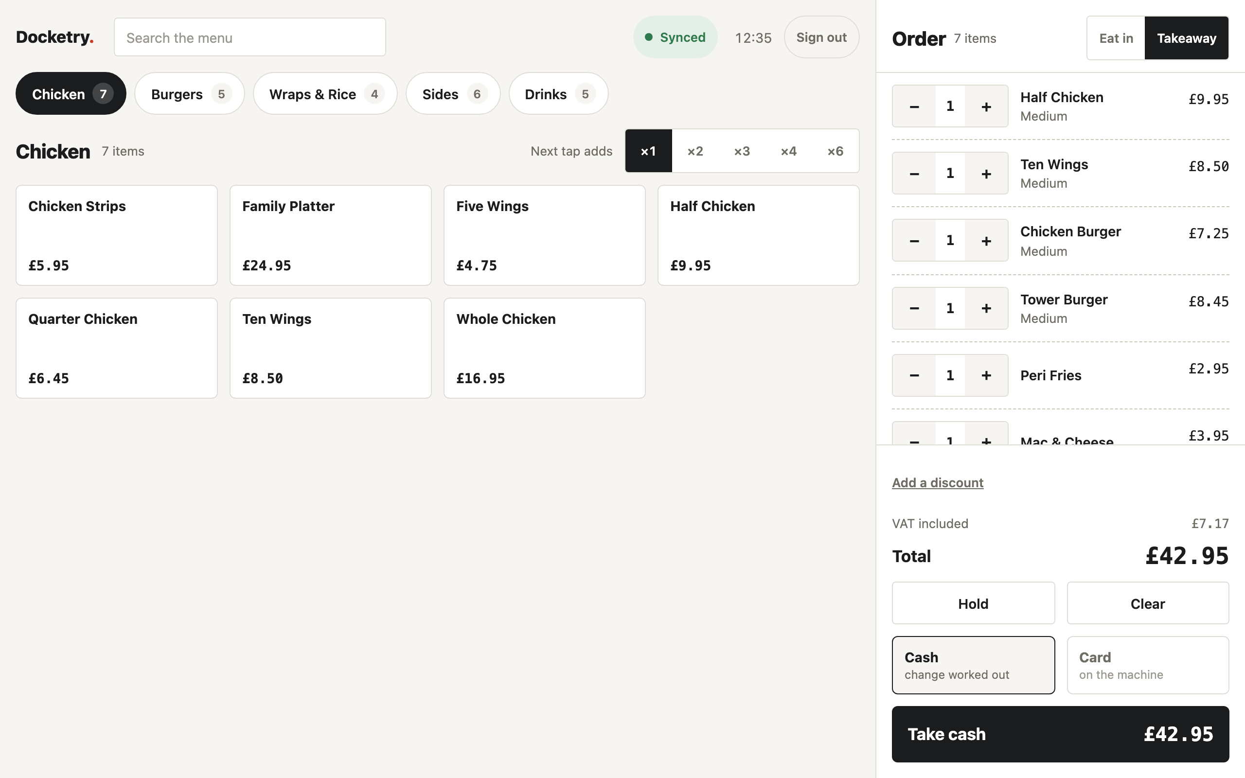 The Docketry till with a menu grid and an order being built.